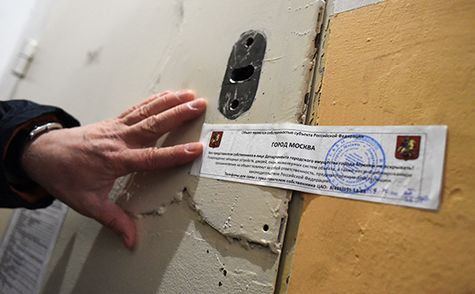 Опечатанная дверь московского офиса Amnesty International. Фото: Кристина Кормилицына/Коммерсантъ